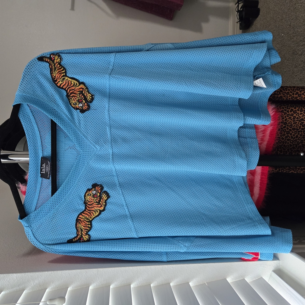 Dressed in LALA Blue Jersey Top with Tiger Patches